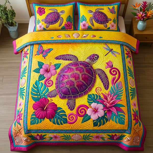 Coastal Turtle quilted 3-piece bedding set on a made bed in a light coastal bedroom