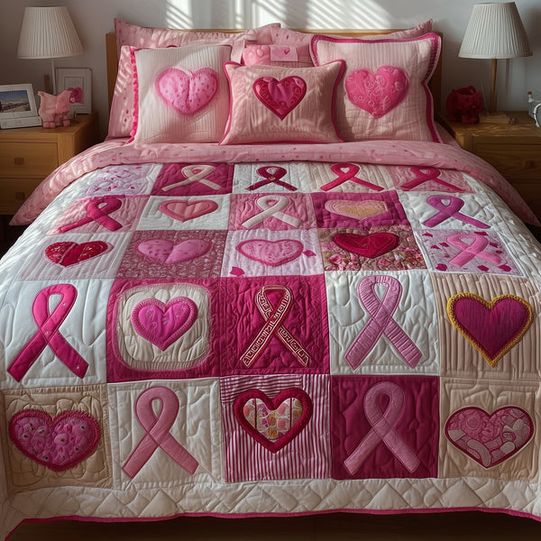 Breast Cancer quilted 3-piece bedding set on a made bed with two matching pillow shams