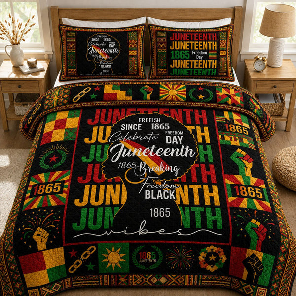 African American Pride quilted 3-piece bedding set on a made bed in a warmly lit bedroom