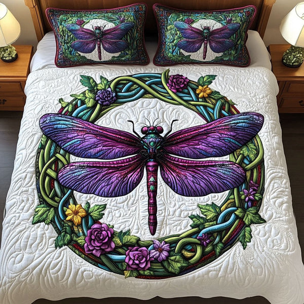 Floral Harmony quilted 3-piece bedding set on a made bed with two matching pillow shams