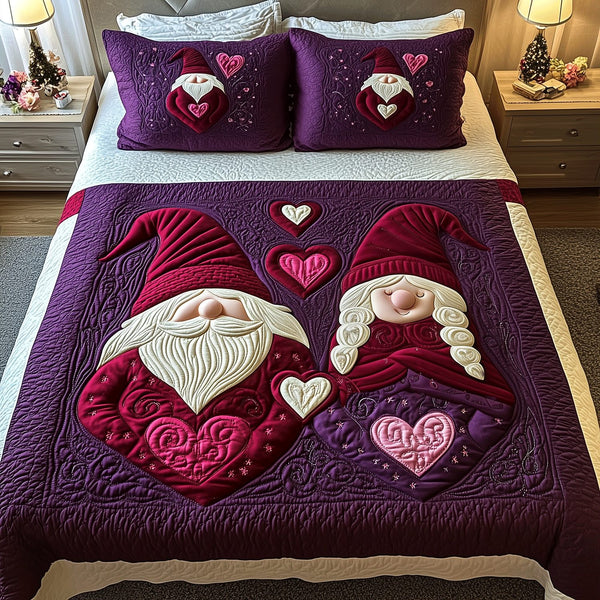 Affectionate Heartbeats quilted 3-piece bedding set on a made bed with two matching pillow shams