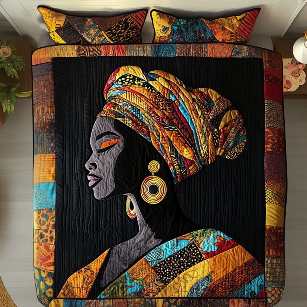 African Elegance quilted 3-piece bedding set on a made bed with two matching pillow shams