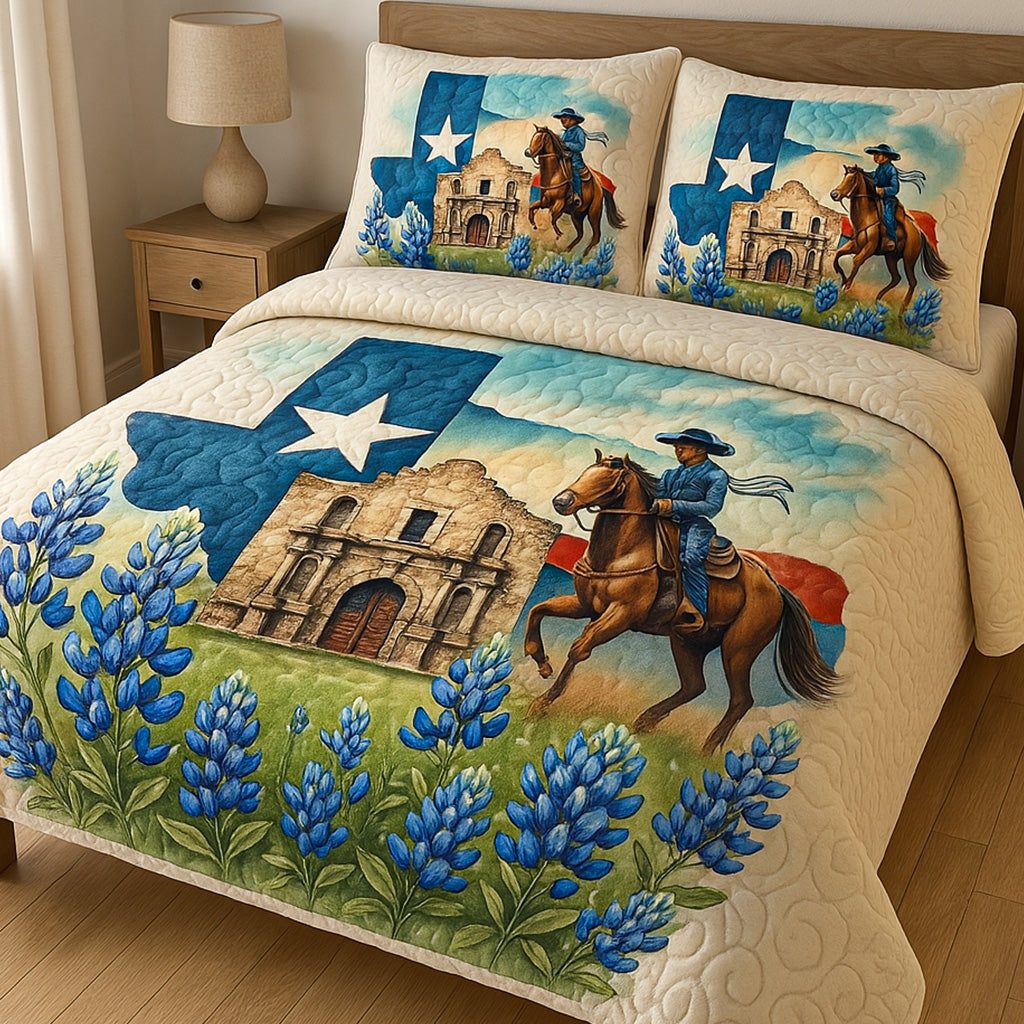 Alamo Pride quilted 3-piece bedding set on a made bed with two matching pillow shams