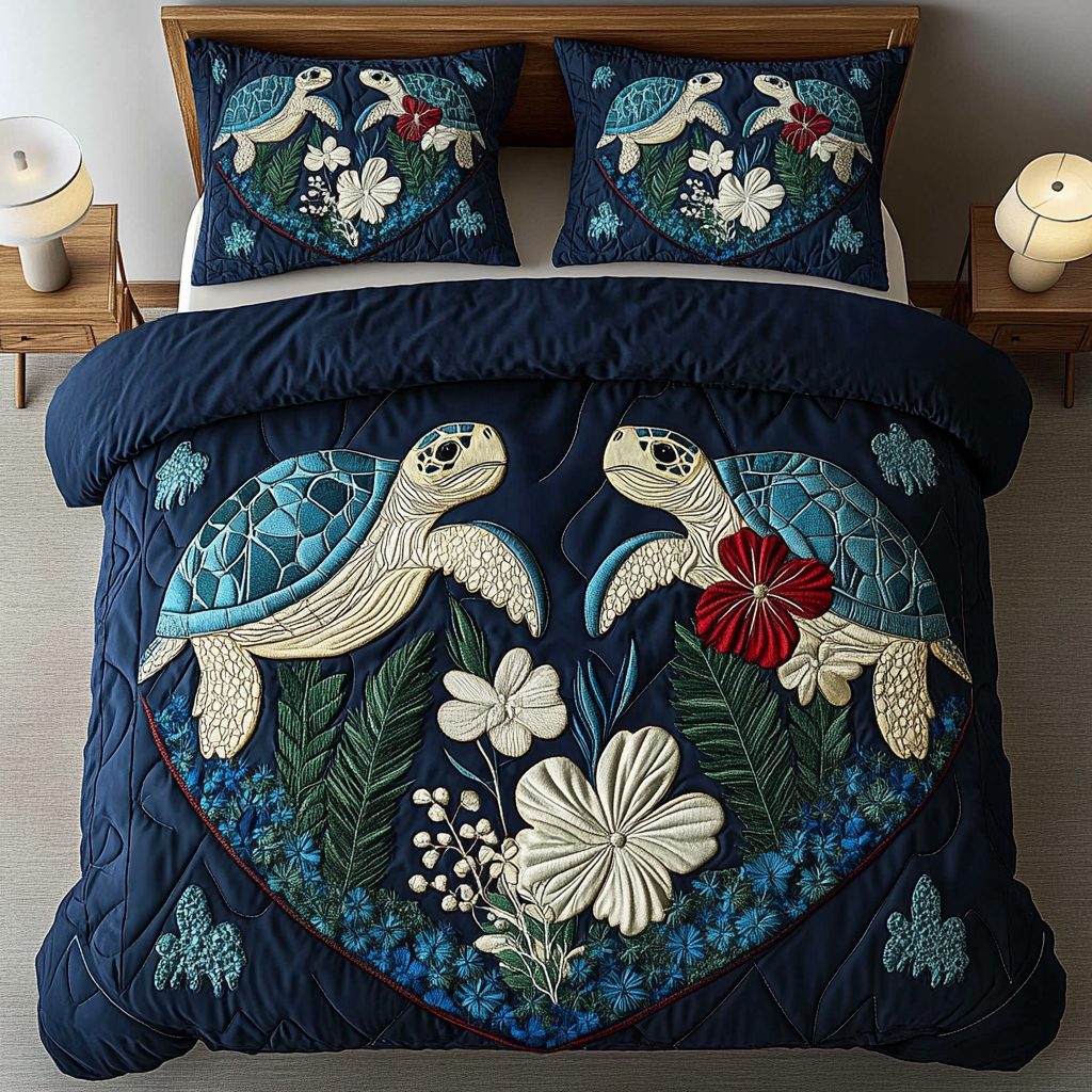 Aqua Haven quilted 3-piece bedding set on a made bed with two matching pillow shams