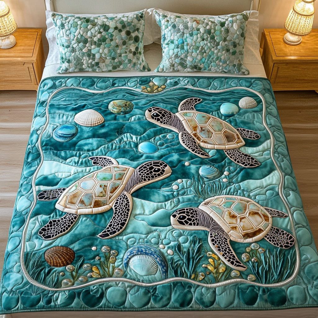 Aqua Haven quilted 3-piece bedding set on a made bed with two matching pillow shams