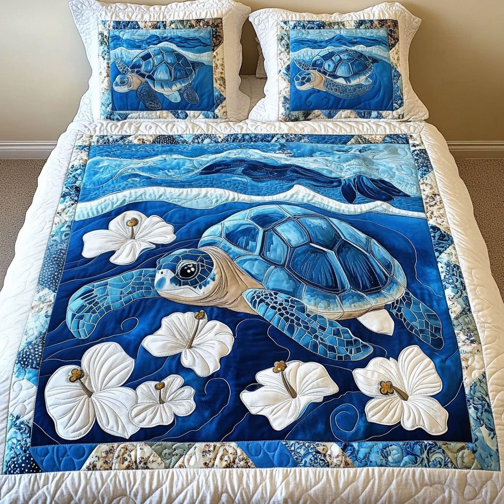 Arctic Drift quilted 3-piece bedding set on a made bed with two matching pillow shams