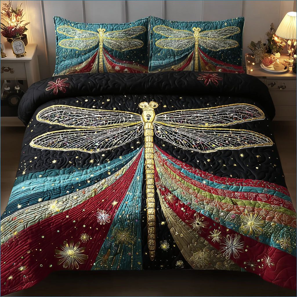 Aurora Flight quilted 3-piece bedding set on a made bed with two matching pillow shams