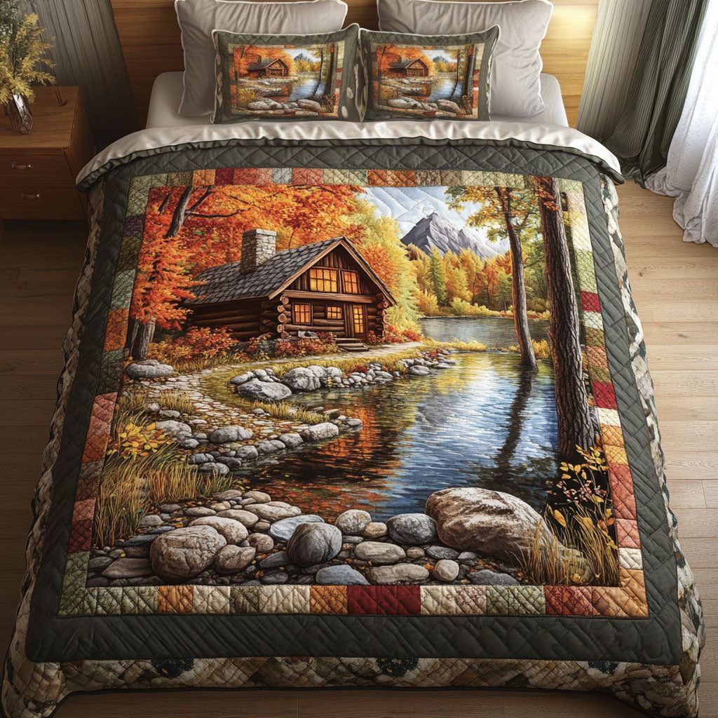 Autumn Lakeside Cabin quilted 3-piece bedding set on a made bed with two matching pillow shams
