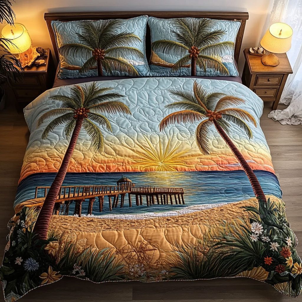 Beachfront Bliss quilted 3-piece bedding set on a made bed in a light coastal bedroom
