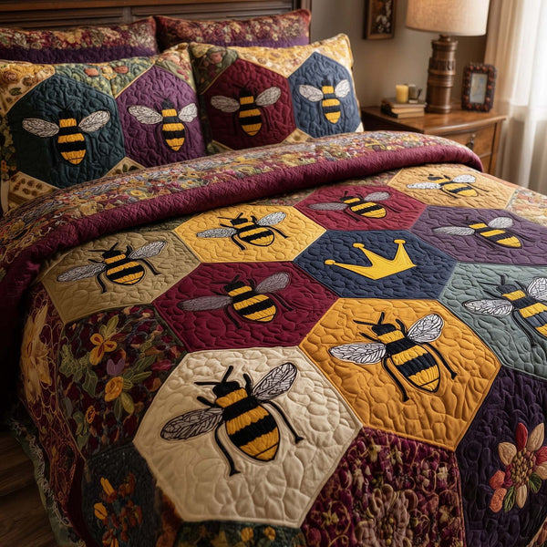Bee Heaven quilted 3-piece bedding set on a made bed in a softly lit bedroom