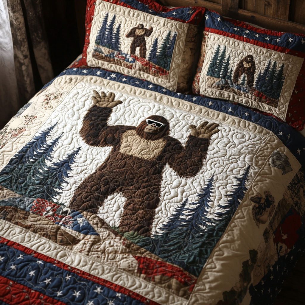 Bigfoot in the Land of the Free quilted 3-piece bedding set on a made bed with two matching pillow shams