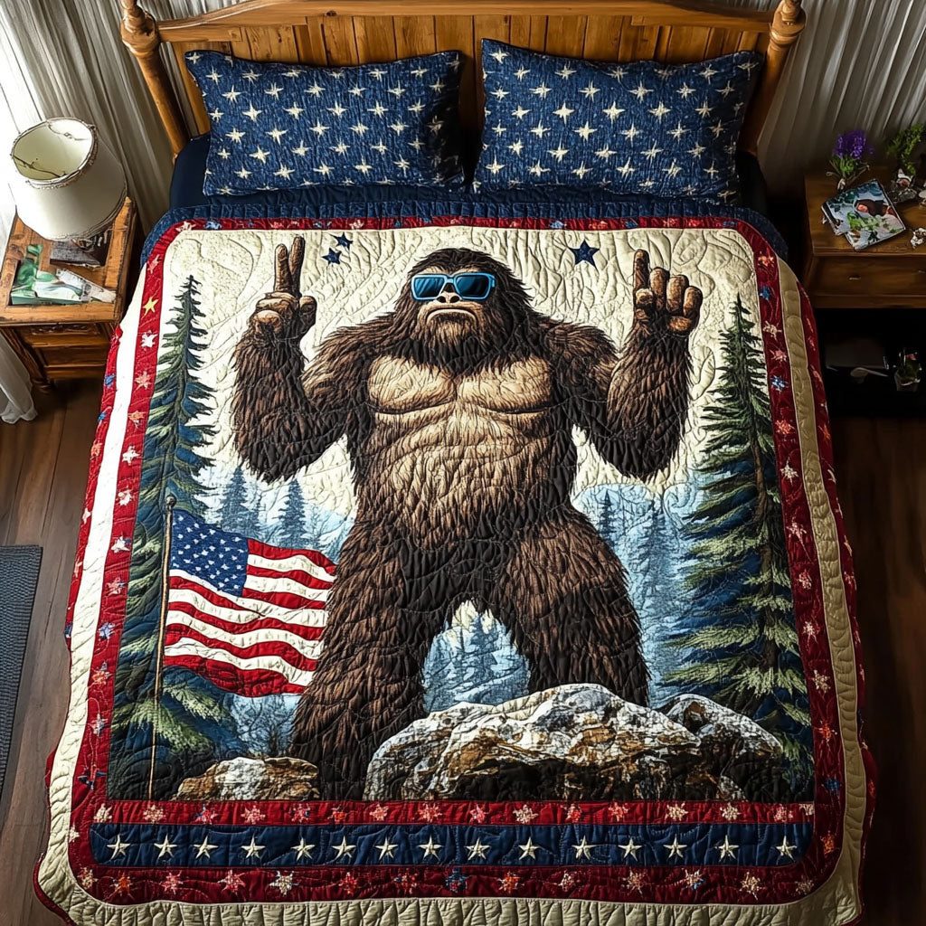 Bigfoot in the Stars quilted 3-piece bedding set on a made bed with two matching pillow shams