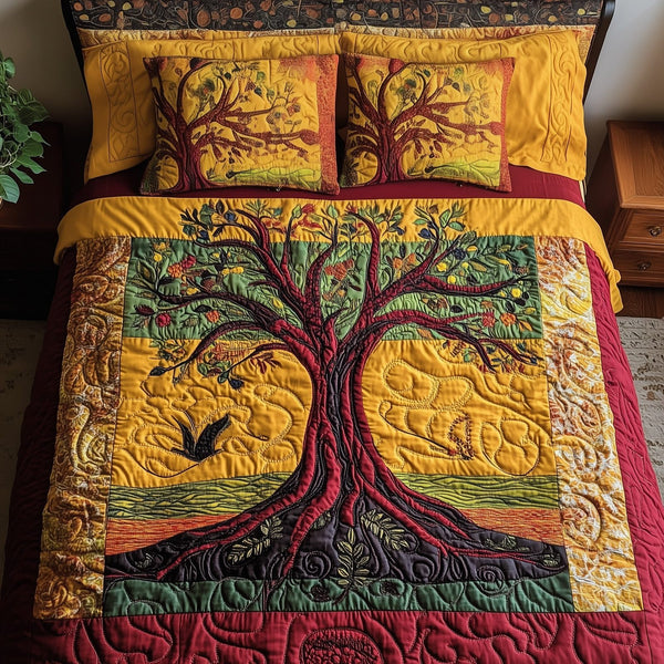 Black History Tree quilted 3-piece bedding set on a made bed with two matching pillow shams