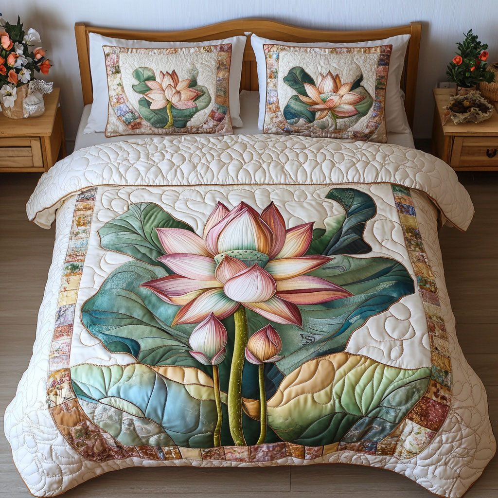 Blooming Grace quilted 3-piece bedding set on a made bed with two matching pillow shams