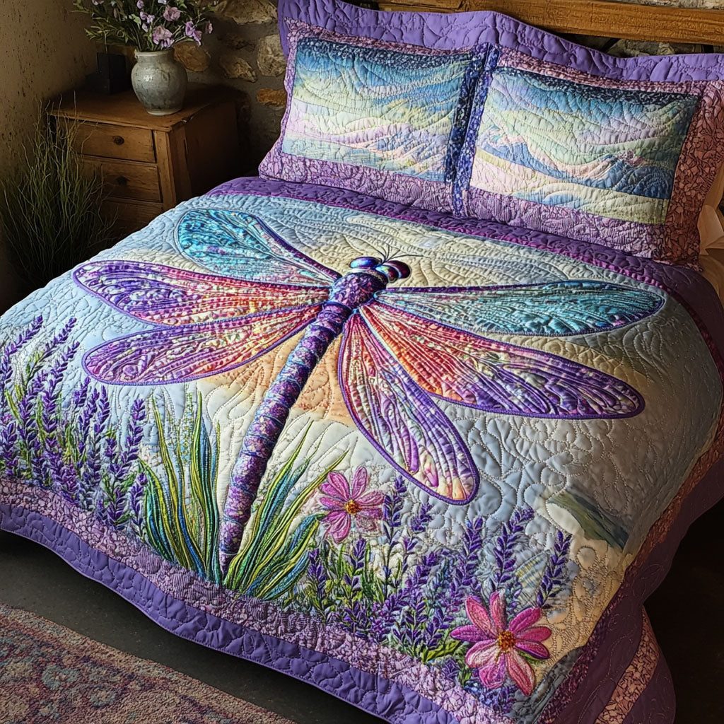 Blooming Winged Beauty quilted 3-piece bedding set on a made bed with two matching pillow shams
