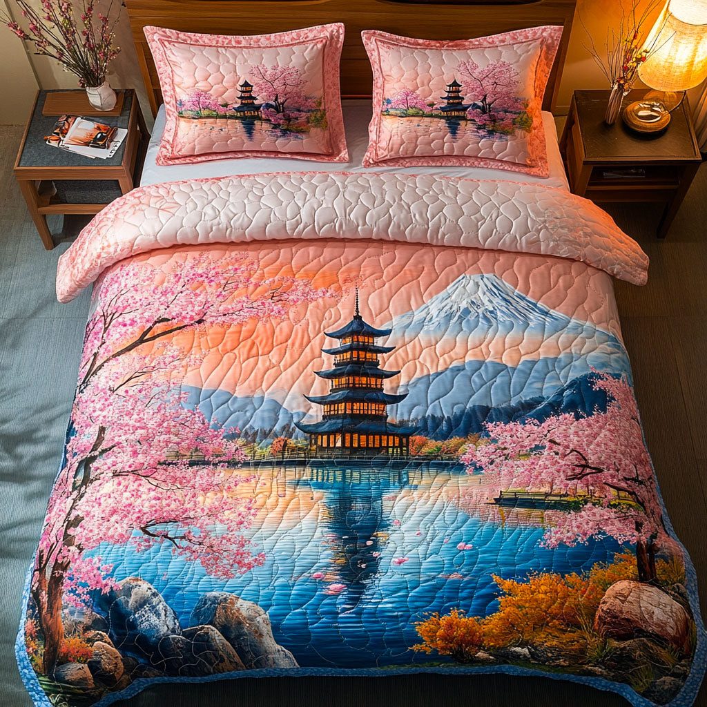 Blossom Horizon quilted 3-piece bedding set on a made bed with two matching pillow shams