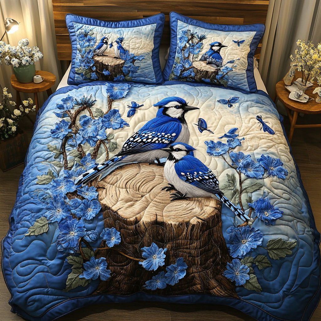 Blossom Serenity quilted 3-piece bedding set on a made bed with two matching pillow shams