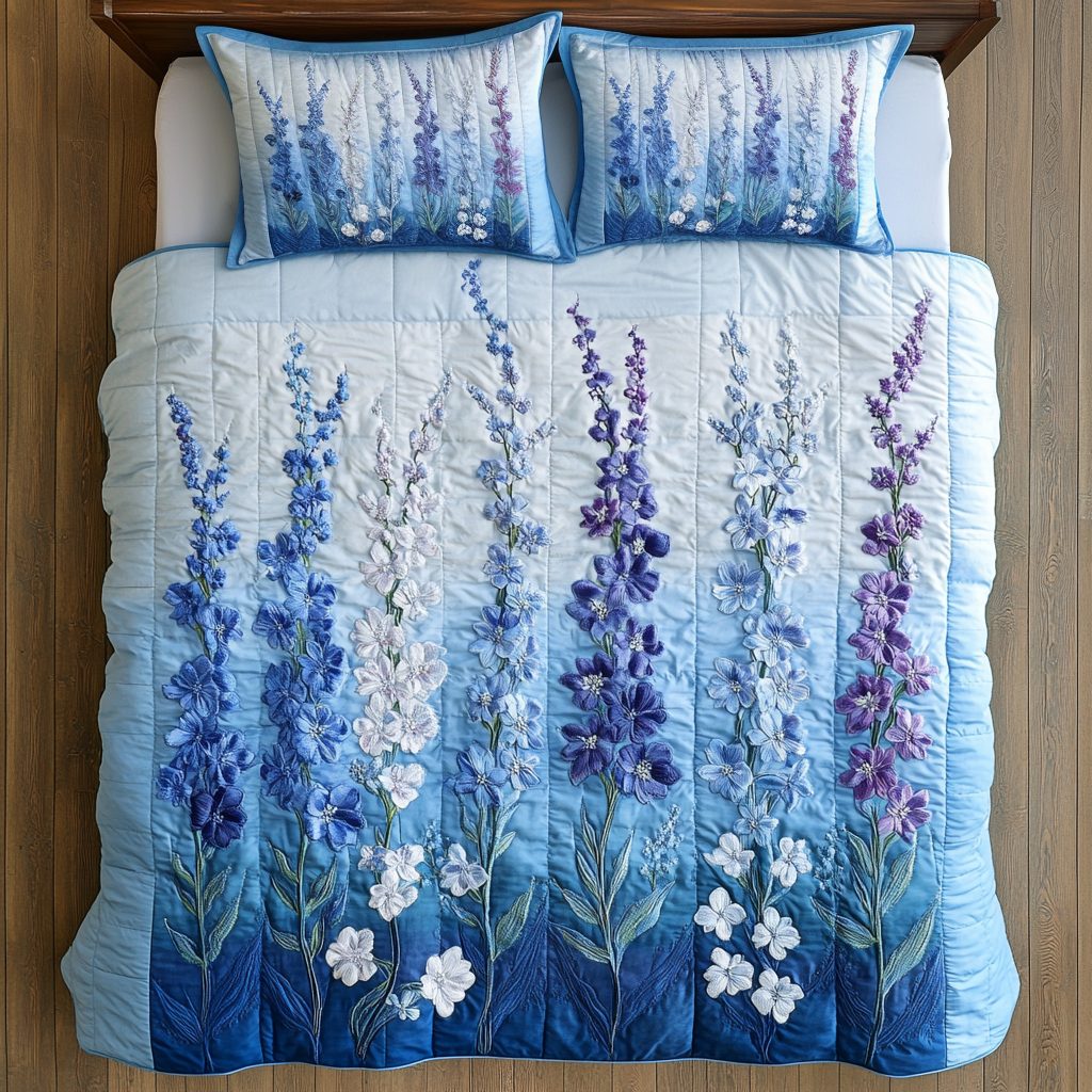 Blue Breeze quilted 3-piece bedding set on a made bed with two matching pillow shams
