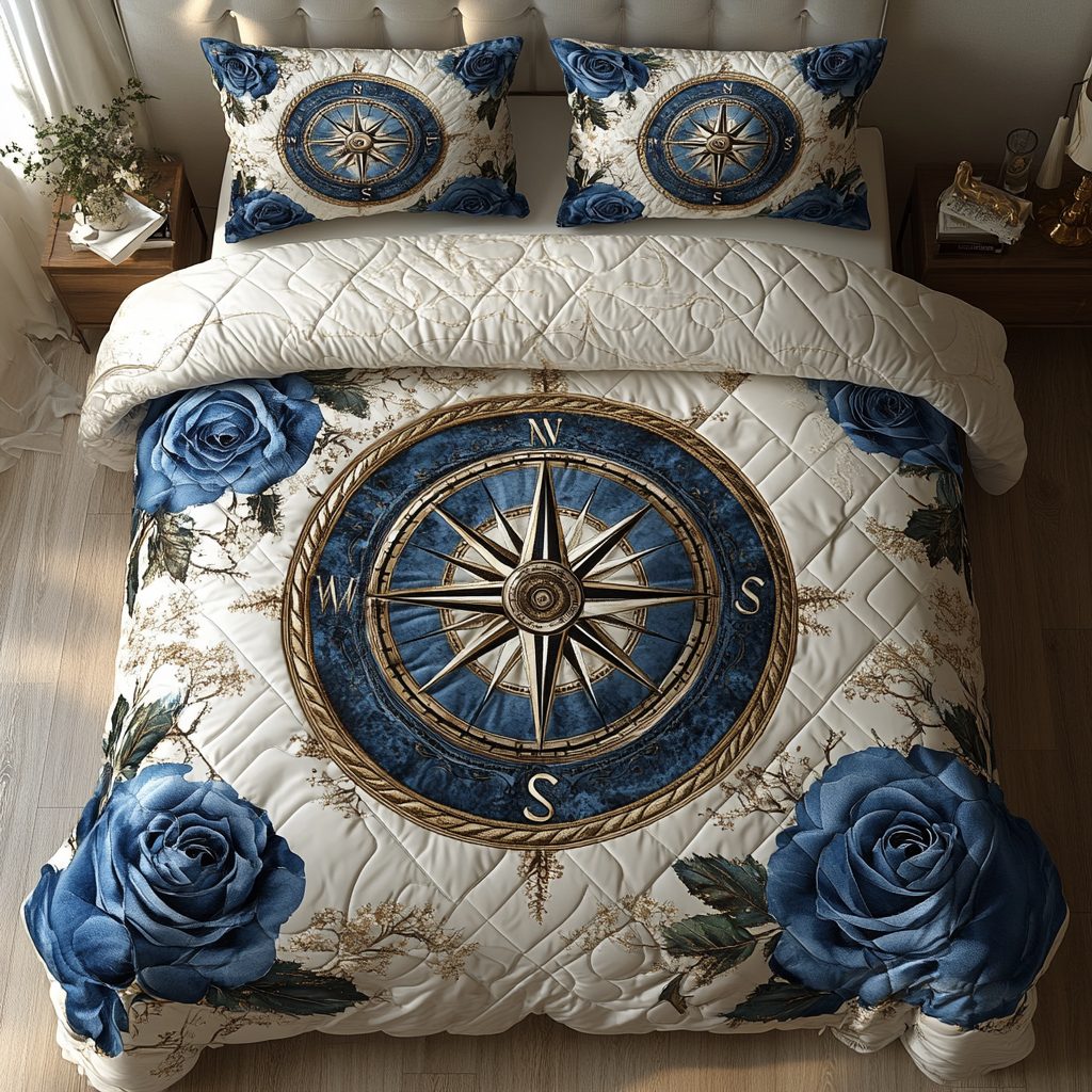 Blue Compass quilted 3-piece bedding set on a made bed with two matching pillow shams