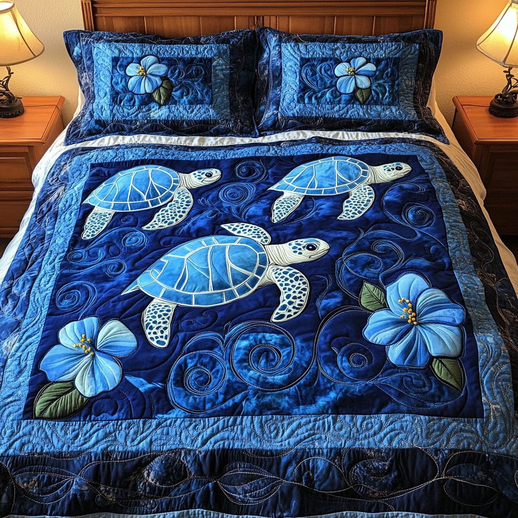 Blue Hibiscus Turtles quilted 3-piece bedding set on a made bed in a light coastal bedroom