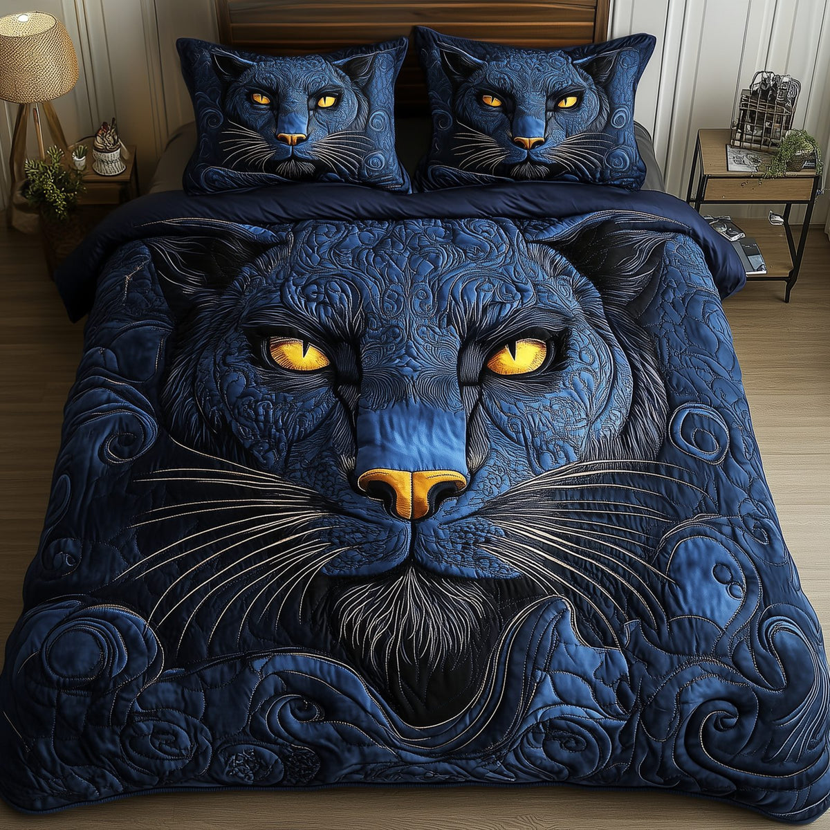 Blue Panther quilted 3-piece bedding set on a made bed with two matching pillow shams