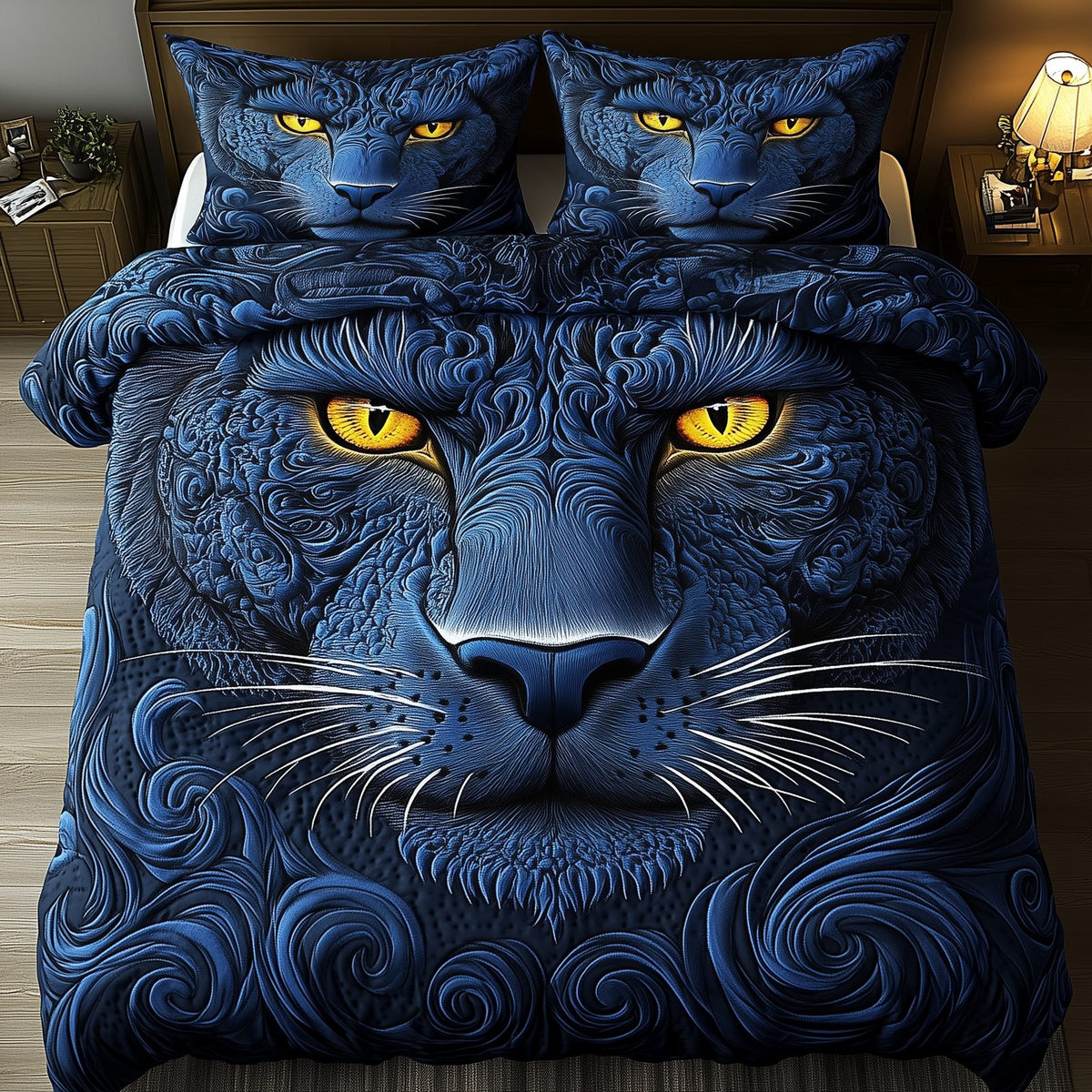 Blue Panther quilted 3-piece bedding set on a made bed with two matching pillow shams
