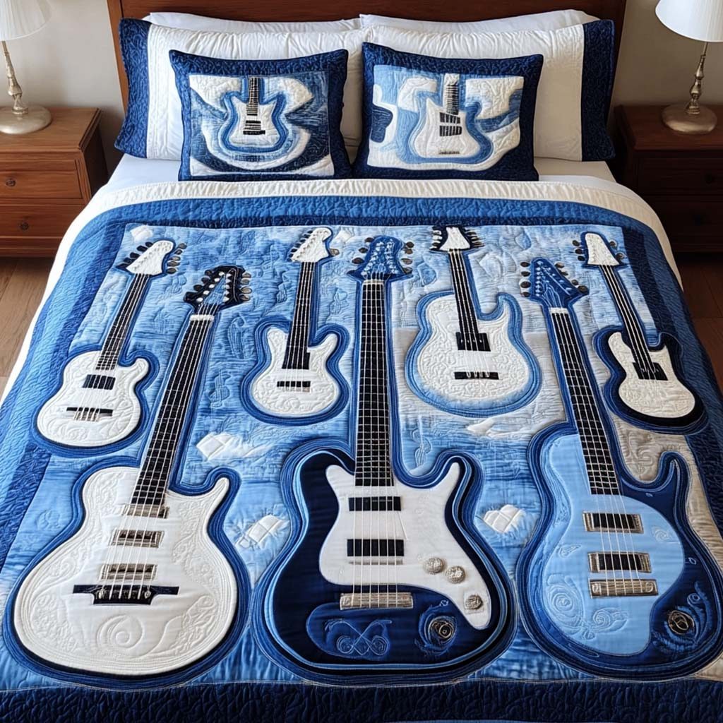 Blue Symphony quilted 3-piece bedding set on a made bed with two matching pillow shams