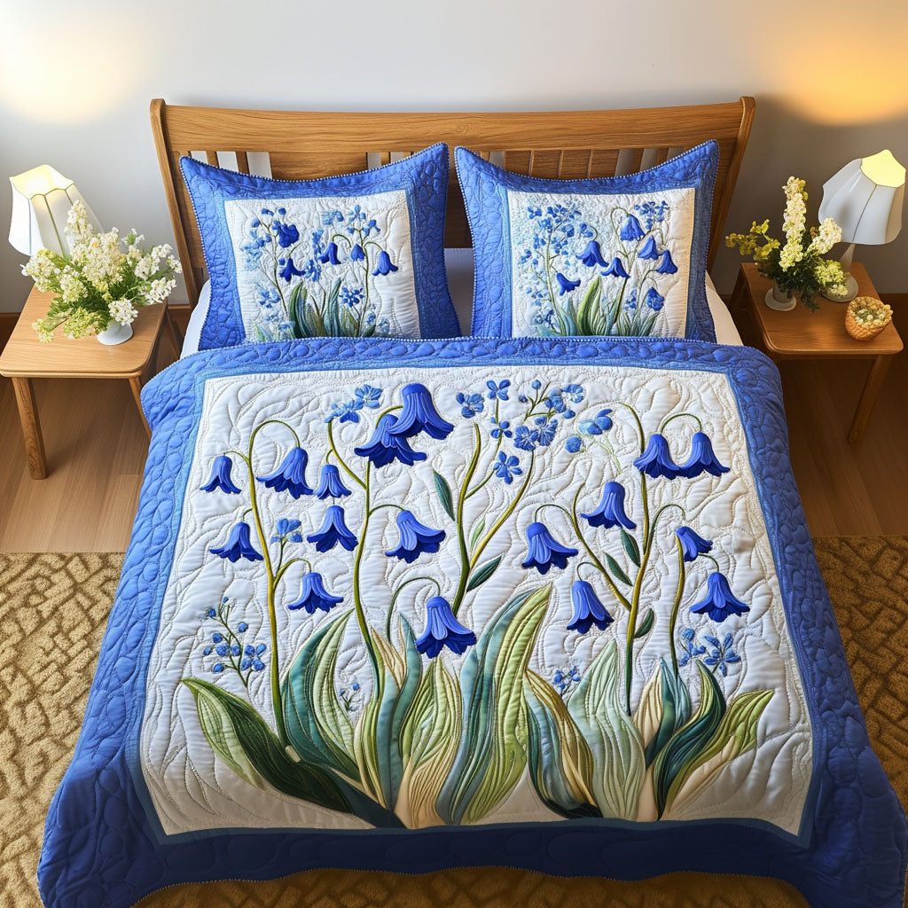 Bluebell Garden quilted 3-piece bedding set on a made bed with two matching pillow shams