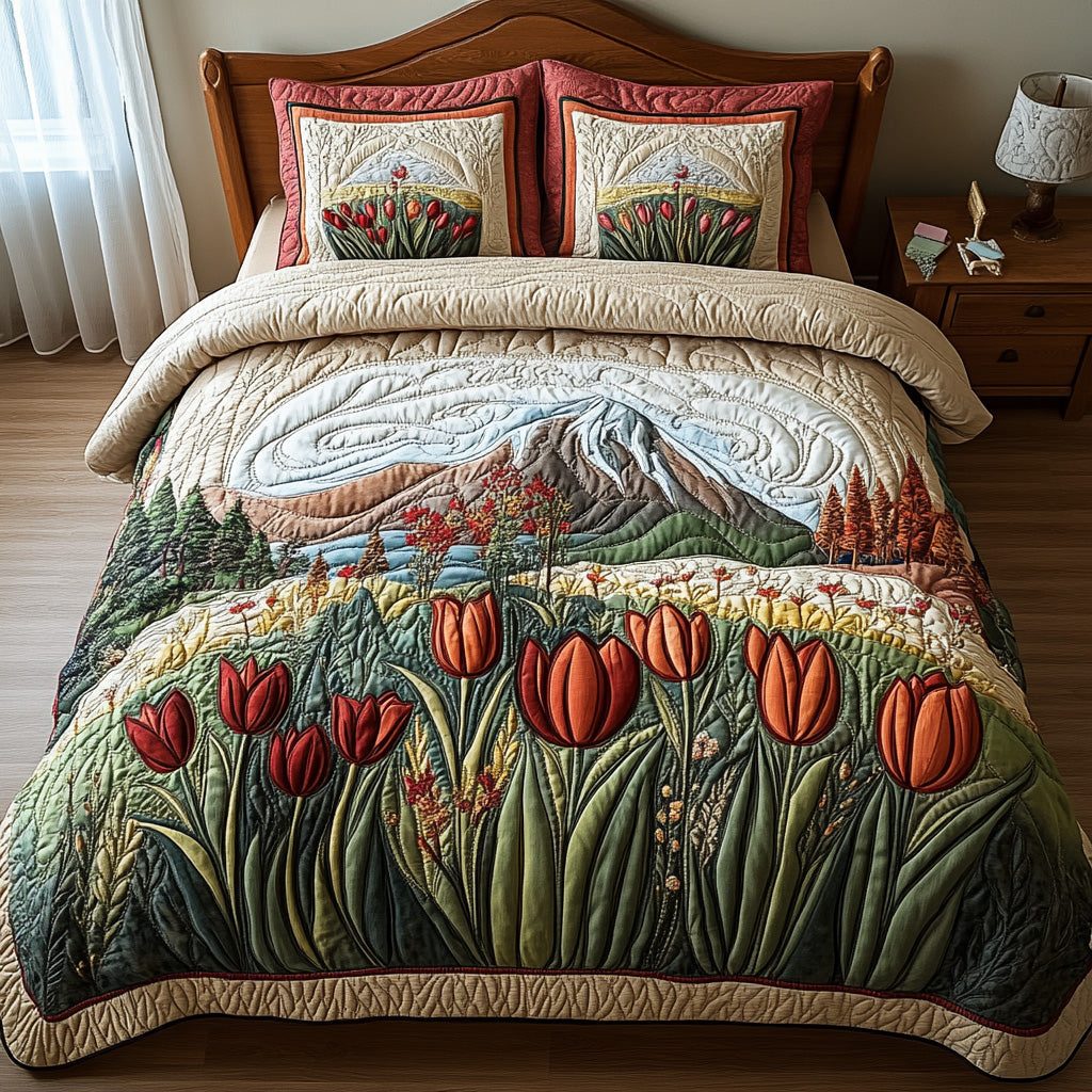 Blushing Fields quilted 3-piece bedding set on a made bed with two matching pillow shams