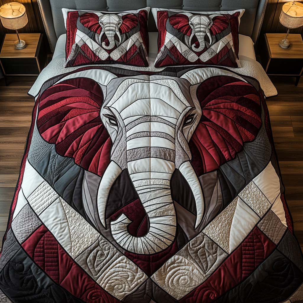 Bold Geometry quilted 3-piece bedding set on a made bed with two matching pillow shams