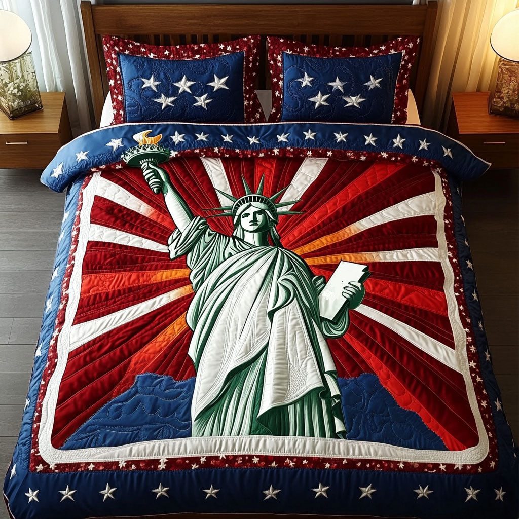 Bold Liberty quilted 3-piece bedding set on a made bed in a warmly lit bedroom