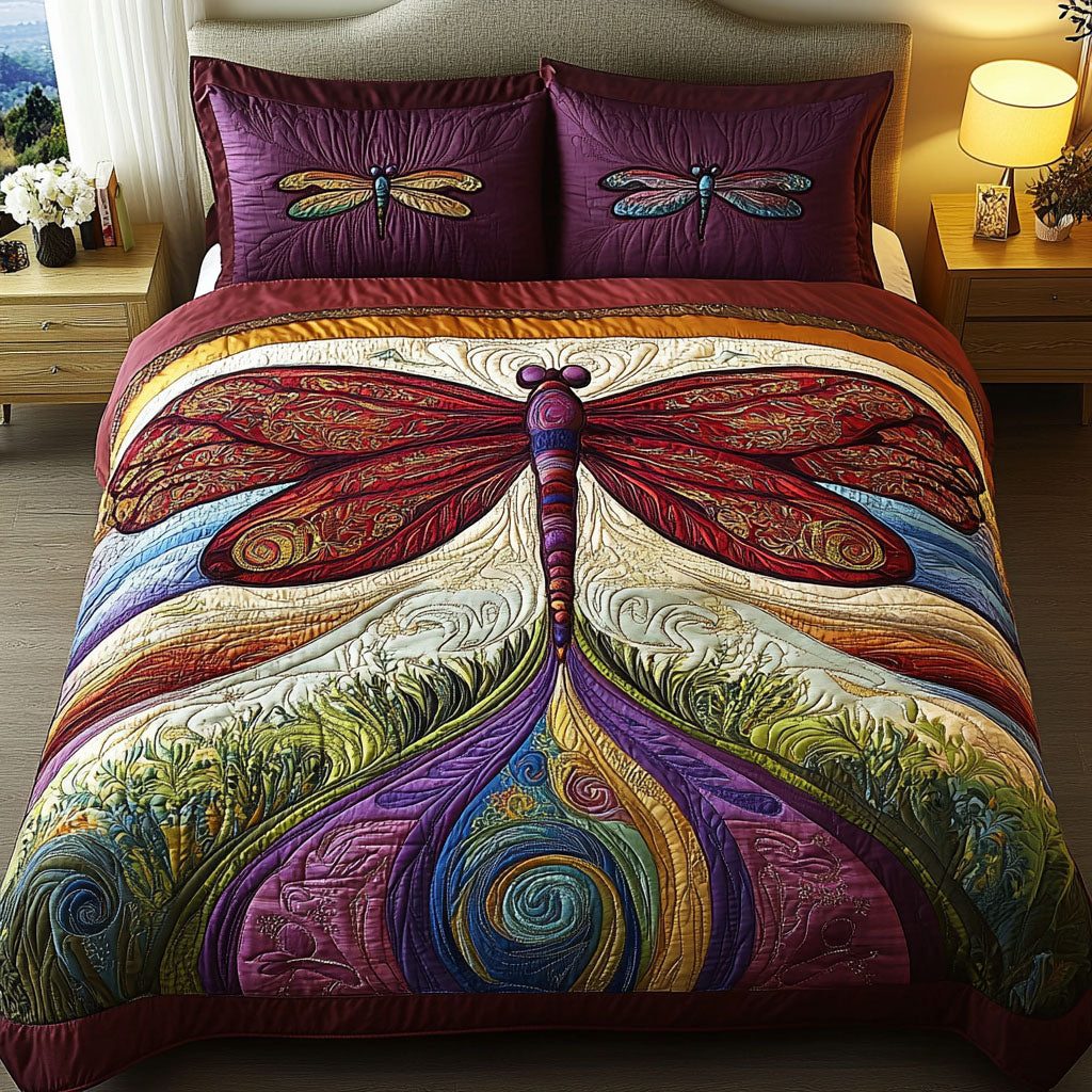 Botanical Wings quilted 3-piece bedding set on a made bed with two matching pillow shams