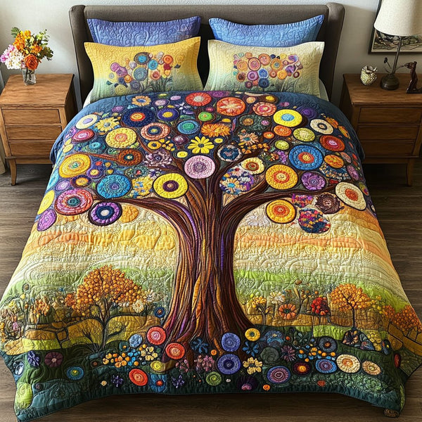 Bright Blossom quilted 3-piece bedding set on a made bed with two matching pillow shams