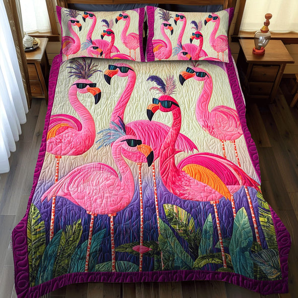 Bright Flamingo Bliss quilted 3-piece bedding set on a made bed with two matching pillow shams