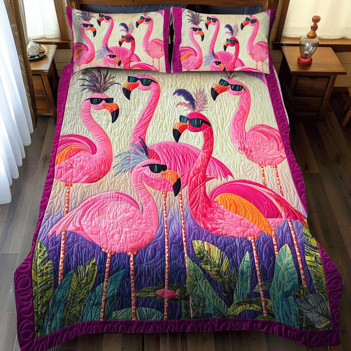 Bright Flamingo Bliss quilted 3-piece bedding set on a made bed with two matching pillow shams