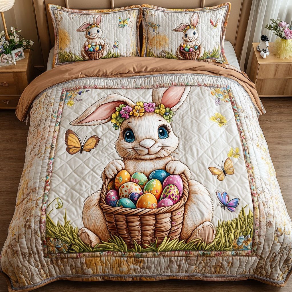 Butterfly Bunny Bliss quilted 3-piece bedding set on a made bed with two matching pillow shams