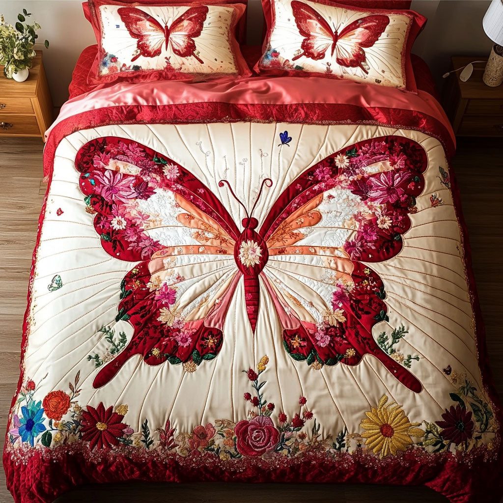 Butterfly Elegance quilted 3-piece bedding set on a made bed with two matching pillow shams