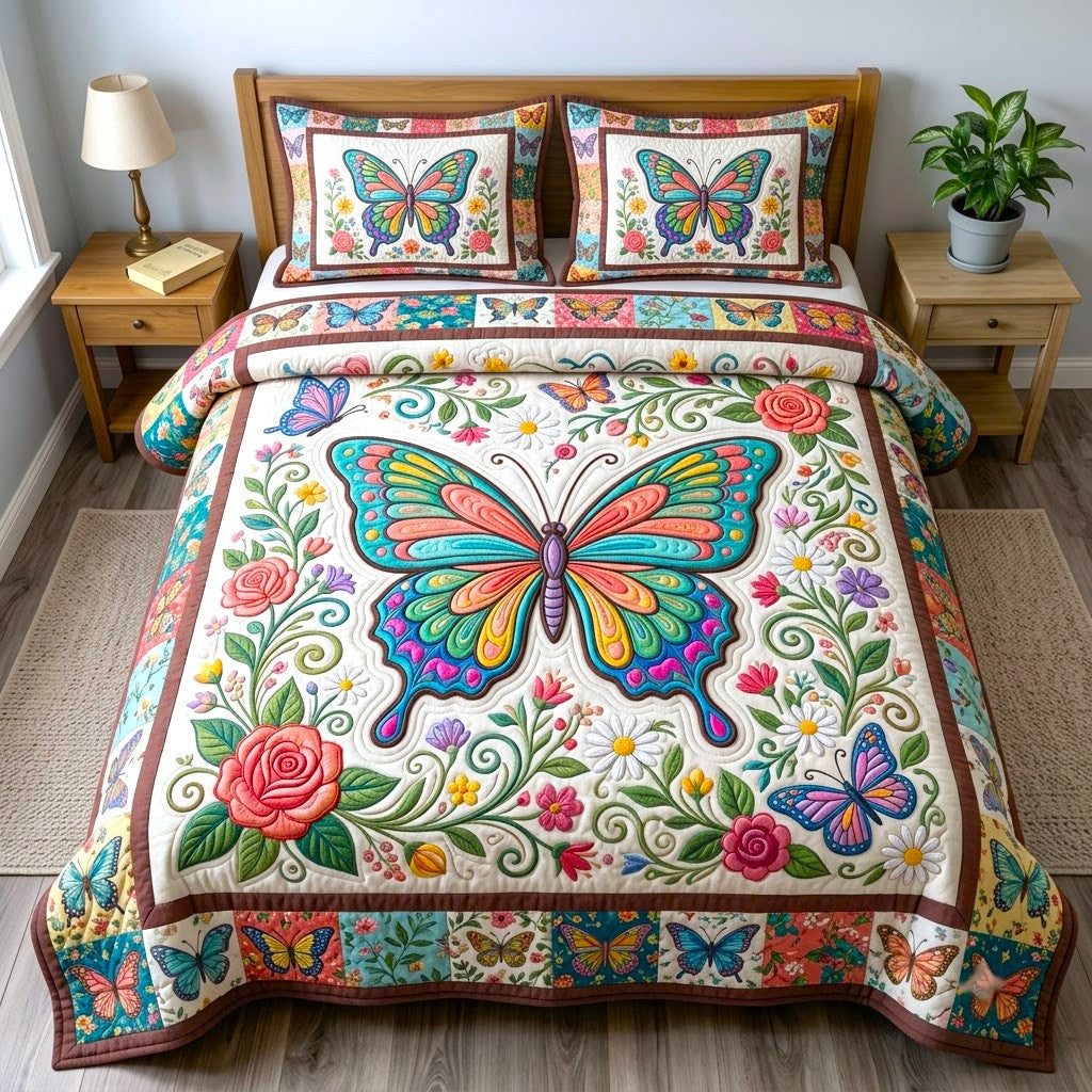 Butterfly Garden quilted 3-piece bedding set on a made bed with two matching pillow shams