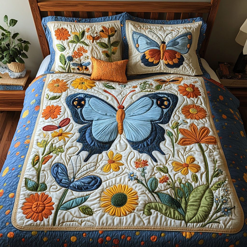 Butterfly Harmony quilted 3-piece bedding set on a made bed with two matching pillow shams