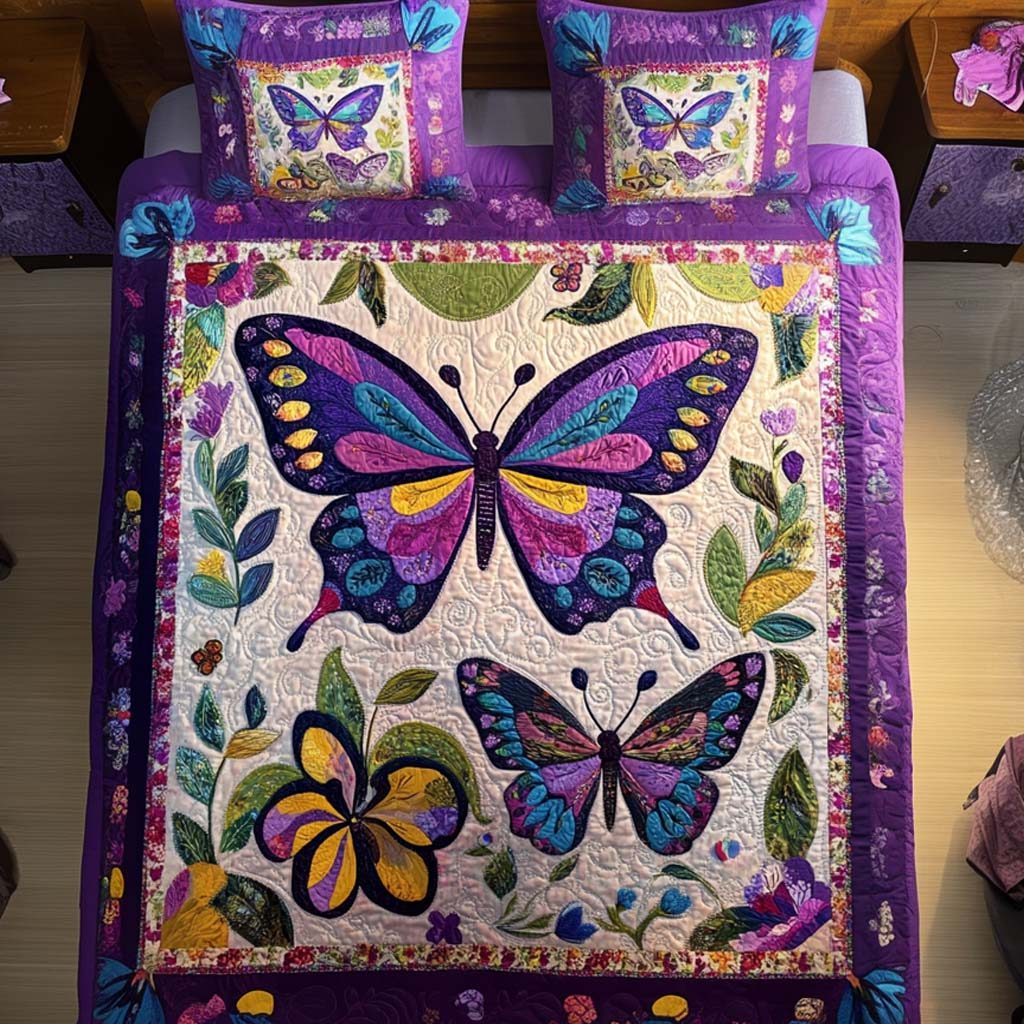 Butterfly Heart Song quilted 3-piece bedding set on a made bed with two matching pillow shams