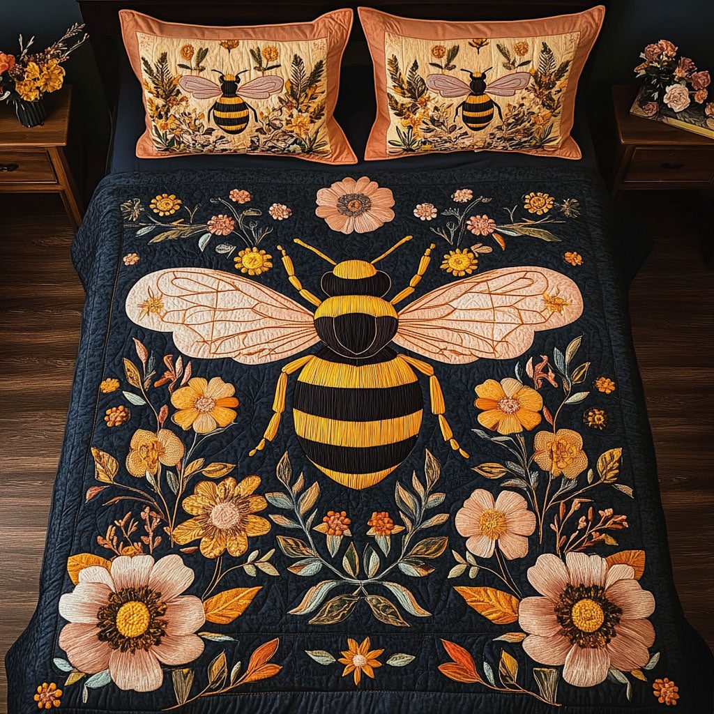 Buzz Harmony quilted 3-piece bedding set on a made bed with two matching pillow shams