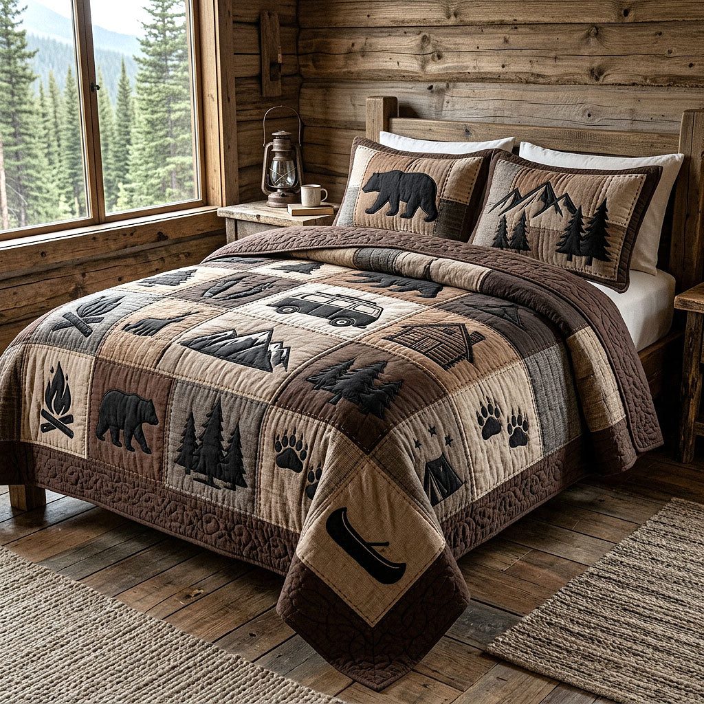 Camp Escape quilted 3-piece bedding set on a made bed with two matching pillow shams