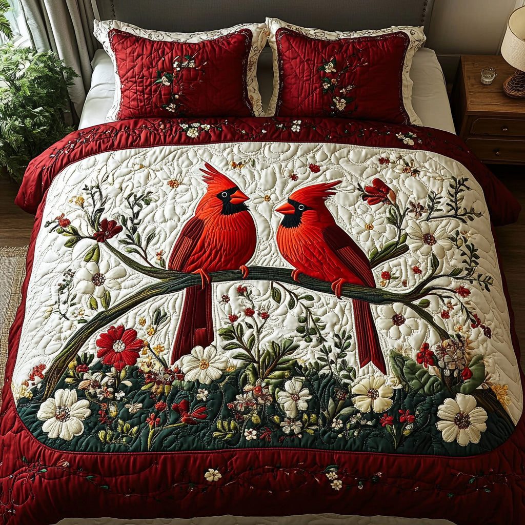 Cardinal quilted 3-piece bedding set on a made bed with two matching pillow shams