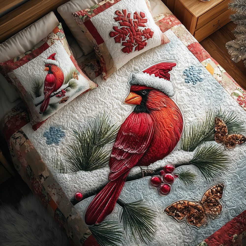 Cardinal Snowfall quilted 3-piece bedding set on a made bed with two matching pillow shams
