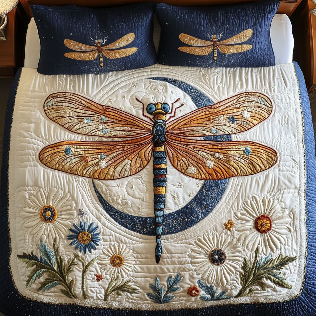 Celestial Glow quilted 3-piece bedding set on a made bed with two matching pillow shams
