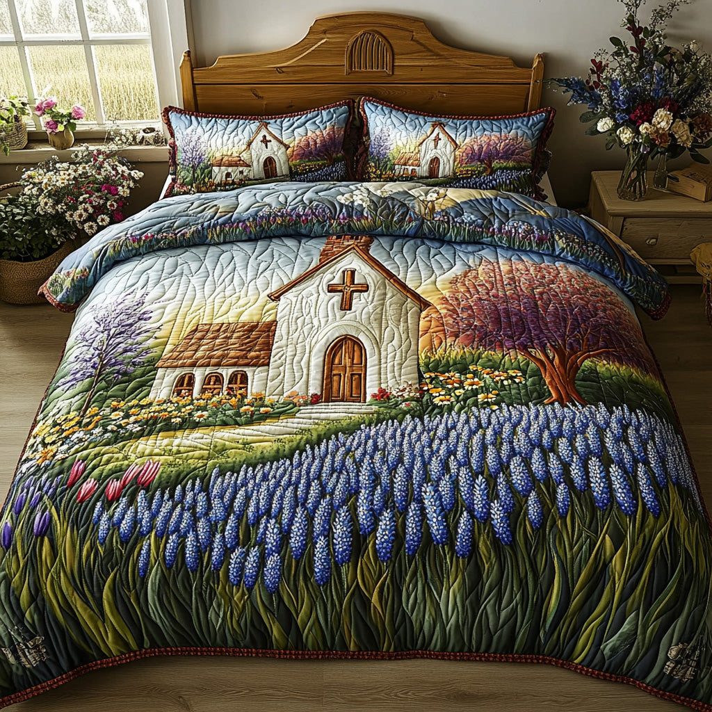 Chapel Bloom quilted 3-piece bedding set on a made bed in a softly lit bedroom