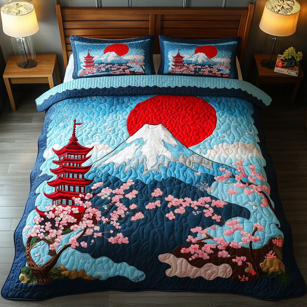 Cherry Blossom Shrine quilted 3-piece bedding set on a made bed with two matching pillow shams