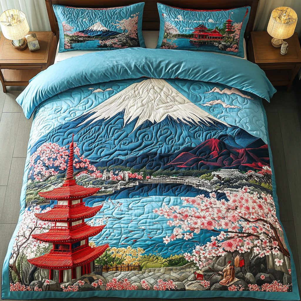 Cherry Tranquil quilted 3-piece bedding set on a made bed with two matching pillow shams