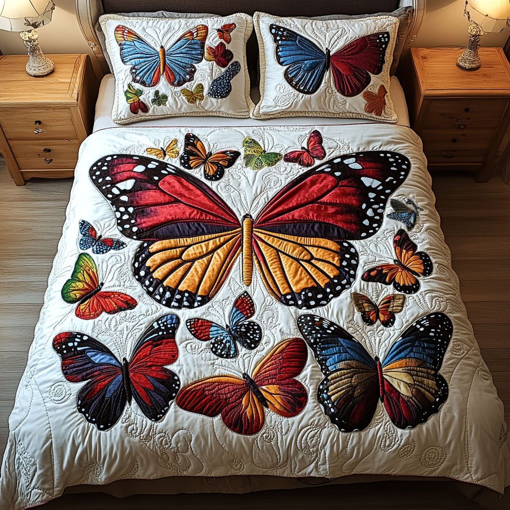 Colorful Whispers quilted 3-piece bedding set on a made bed with two matching pillow shams