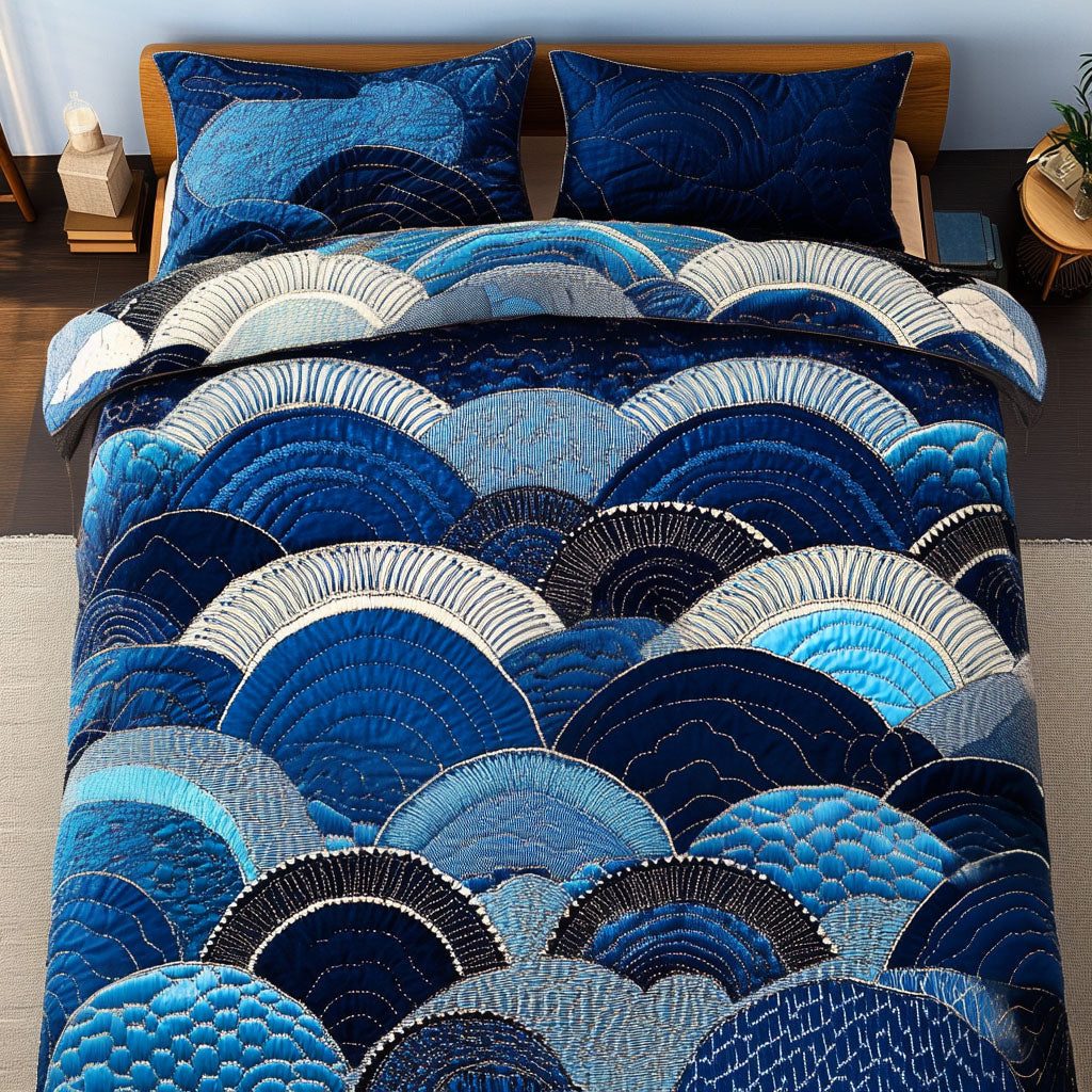 Crimson Bloom quilted 3-piece bedding set on a made bed with two matching pillow shams